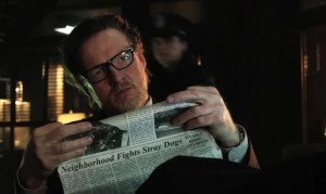 guy reading newspaper