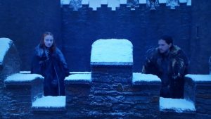 Jon and Sansa standing at Winterfell