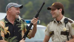 Frank Darabont with shotgun on the set of The Walking Dead