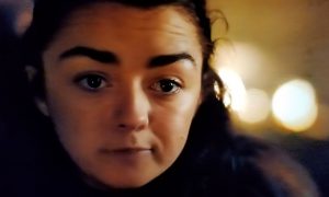 Arya sits in a tavern talking to Hot Pie.