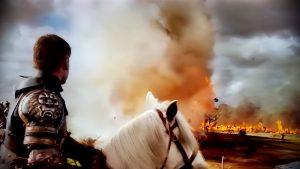 Jamie Lannister watches as his troops are burned alive in Spoils of War