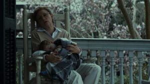 Daisy rocks old baby Benjamin Button in The Curious Case of Benjamin Button