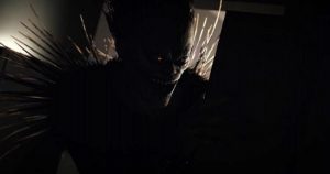 Ryuk hides in the shadows while talking to Light Turner