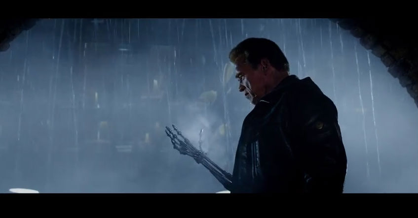arnold looking at his terminator hand