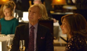 guy sitting a table with woman
