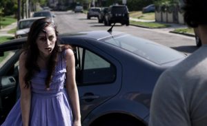 Zombie Samantha shuffles towards a potential meal.