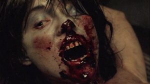 The zombie Deadgirl screaming to be set free