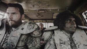 Barry and Benny driving through the zombie wasteland.