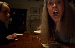 Grandma in The Visit eats with her mouth full