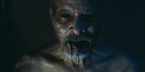 A nightmare grandpa bleeds from his mouth showing symptoms of the plague.