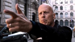 Bruce WIllis points a finger in Revenge