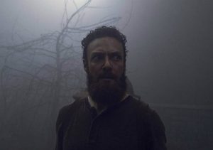Aaron walks around in the fog during season nine of The Walking Dead