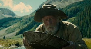 Tom Waits pans for gold in The Ballad of Buster Scruggs