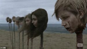 Heads on stakes in a nice even line in season nine of The Walking Dead