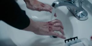 Olivia Wilde's busted knuckles in the revenge movie A Vigilante