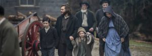 Patrick Tate and his family on their way to church in the Western Never Grow Old