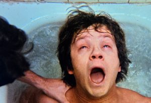 Tim Robbins is dunked in a bathtub filled with ice in Jacob's Ladder